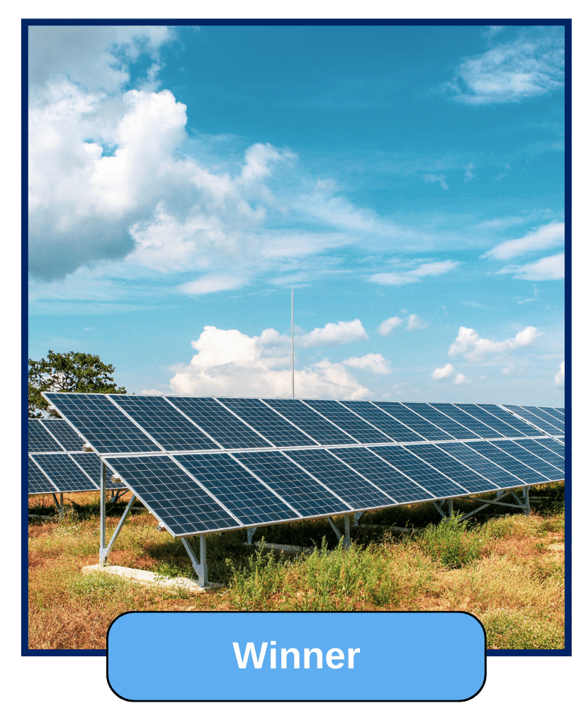 A solar panel farm under a blue sky, harnessing sunlight for clean energy production.