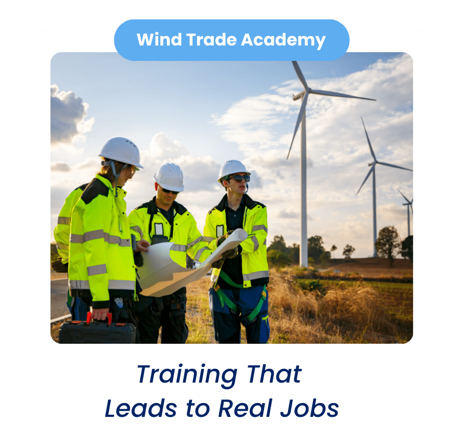 Wind technicians discussing turbine plans during certified training program